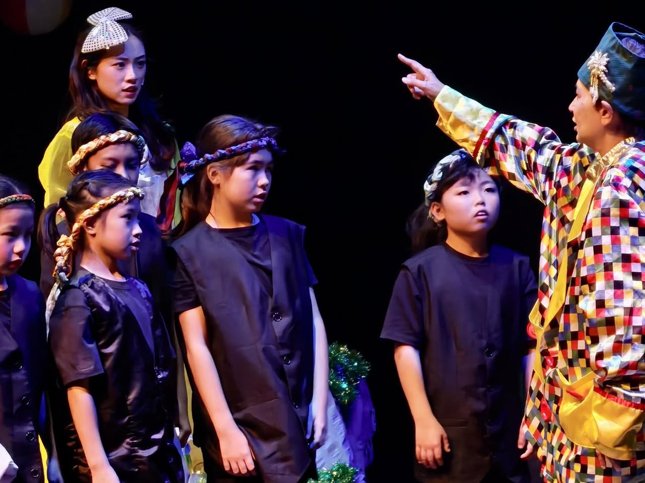 A lively moment captured from the 'Scrooge' play