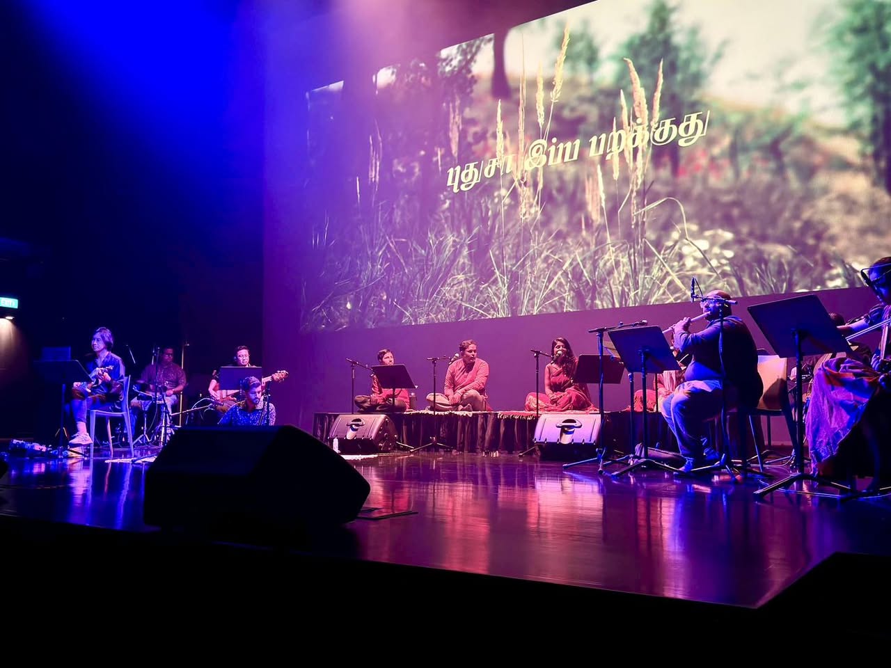 The vibrant stage of Festive Arts Theatre during Ainthinai