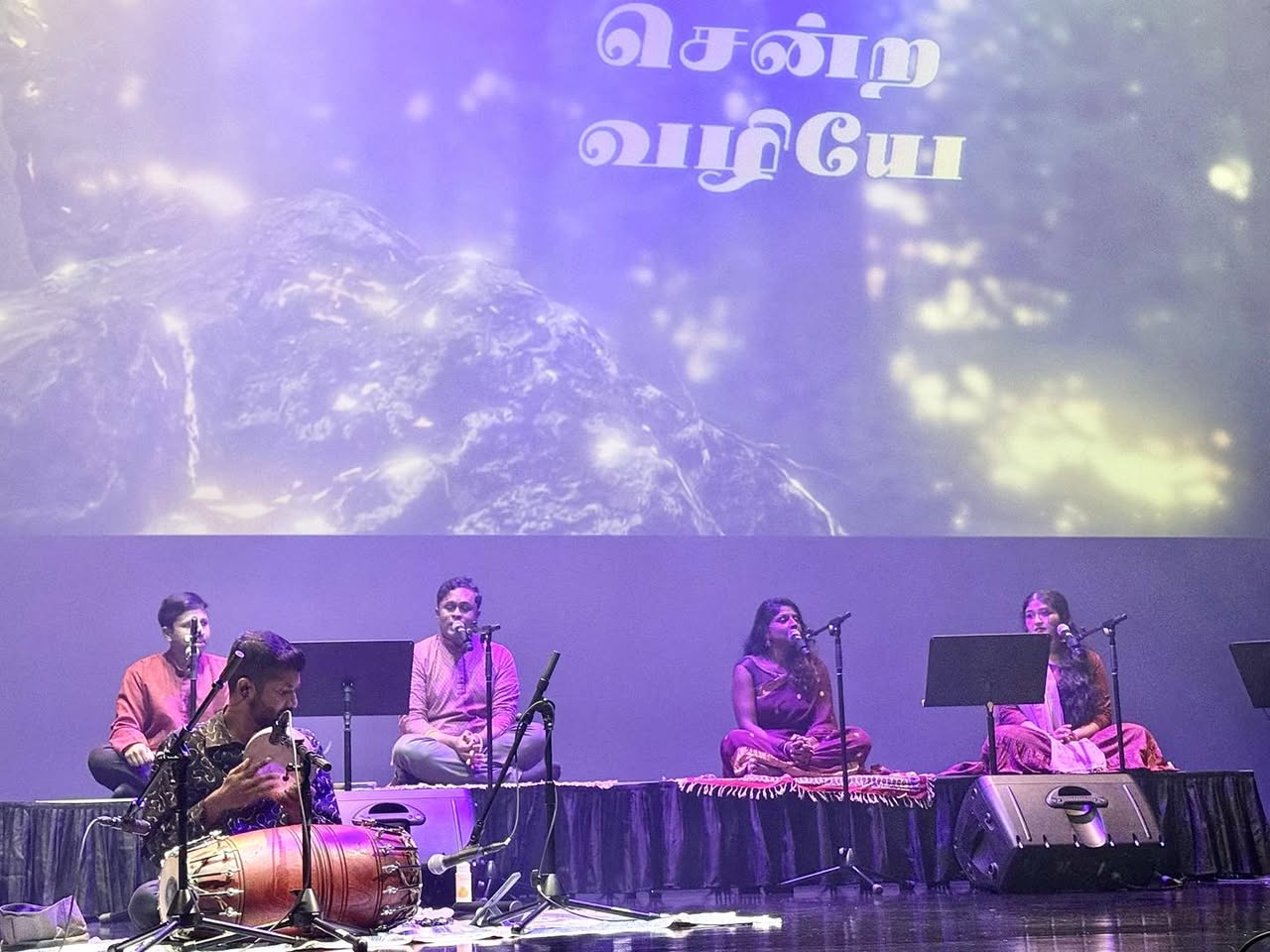 Performers on stage during the Ainthinai: A Timeless Bond event at Festive Arts Theatre