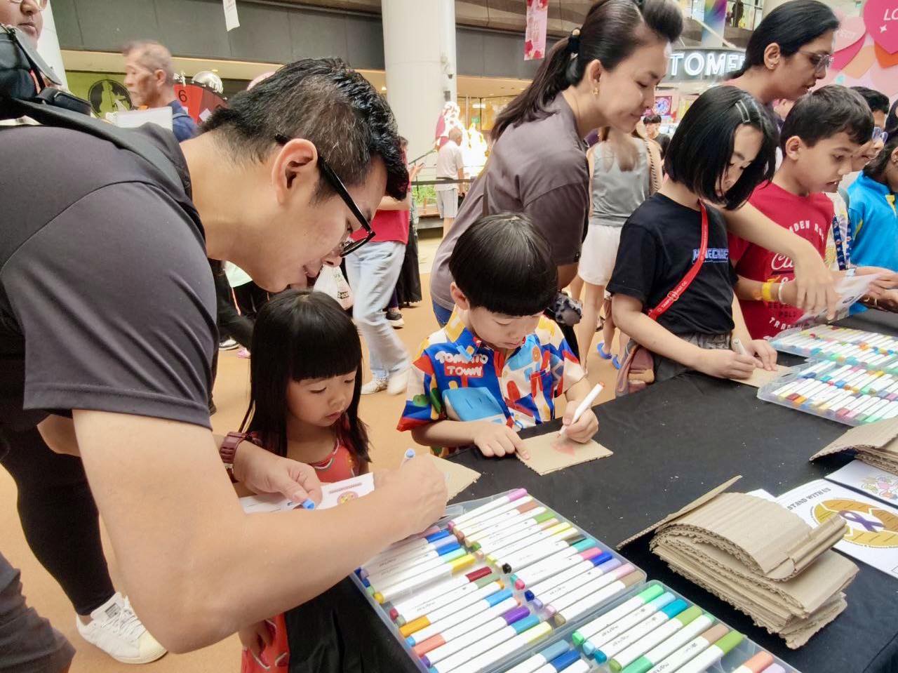 Visitors exploring the community resources available at Our Tampines Hub.