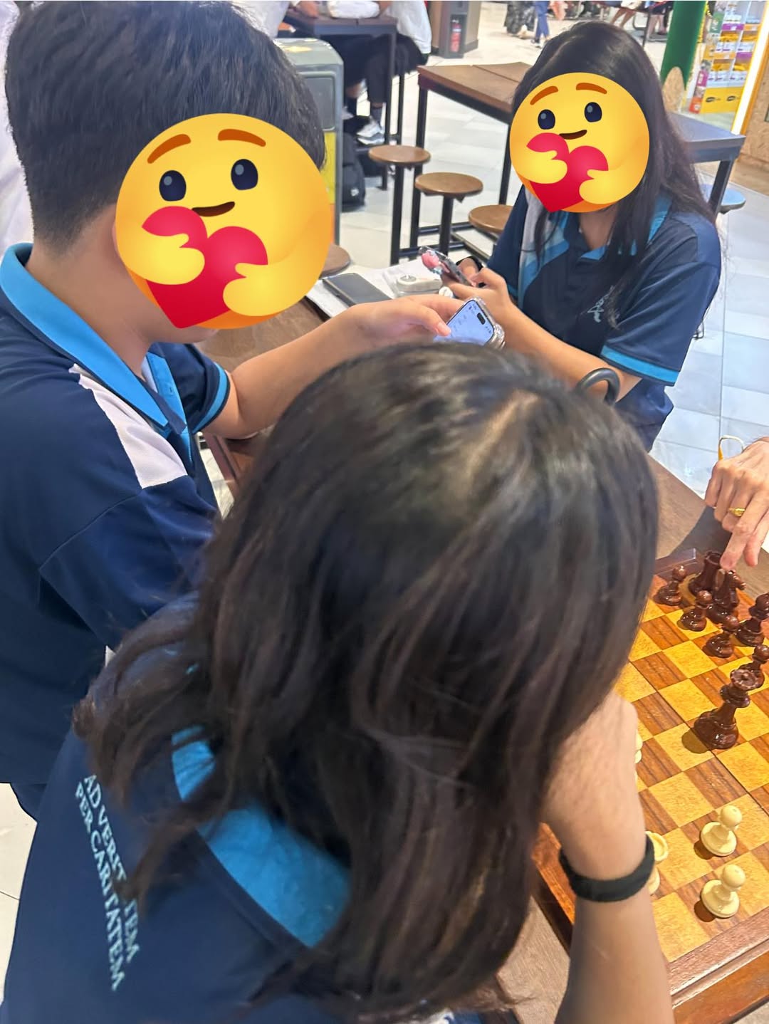 Youth volunteers and seniors connecting through shared moments of kindness in the community.