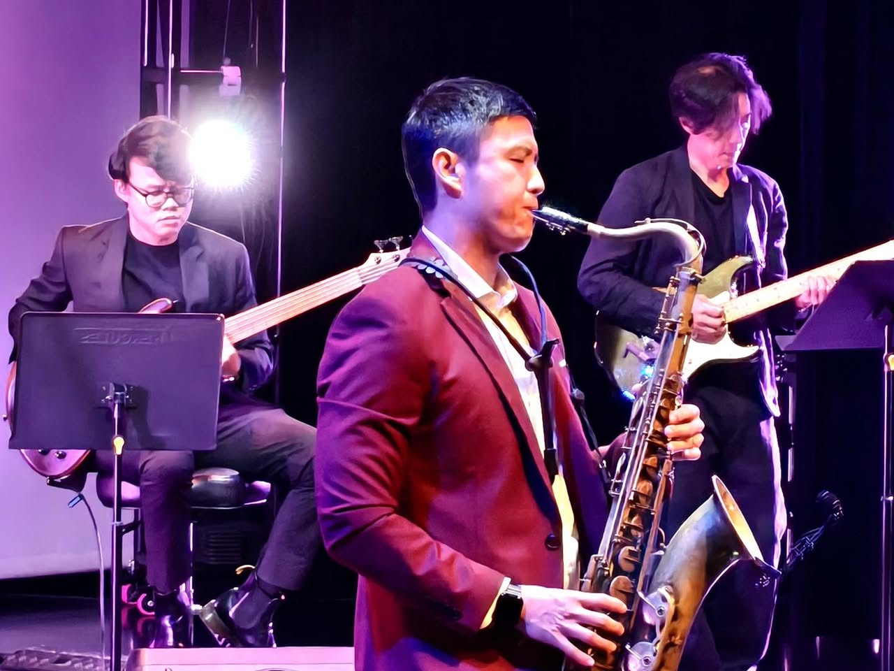 Audience members enjoying the live jazz performance