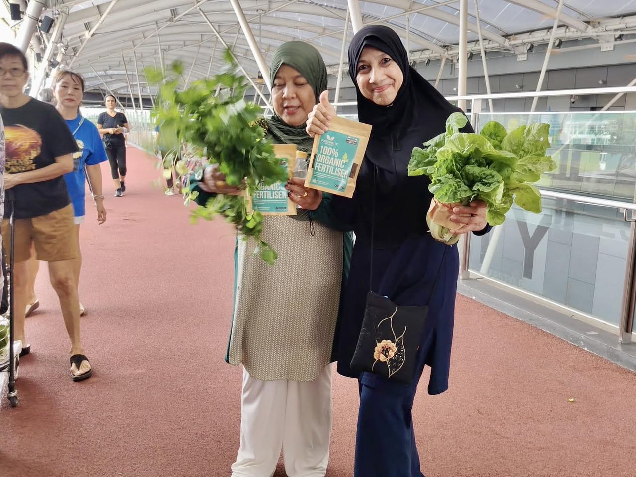 Local residents gathering for the community harvest morning
