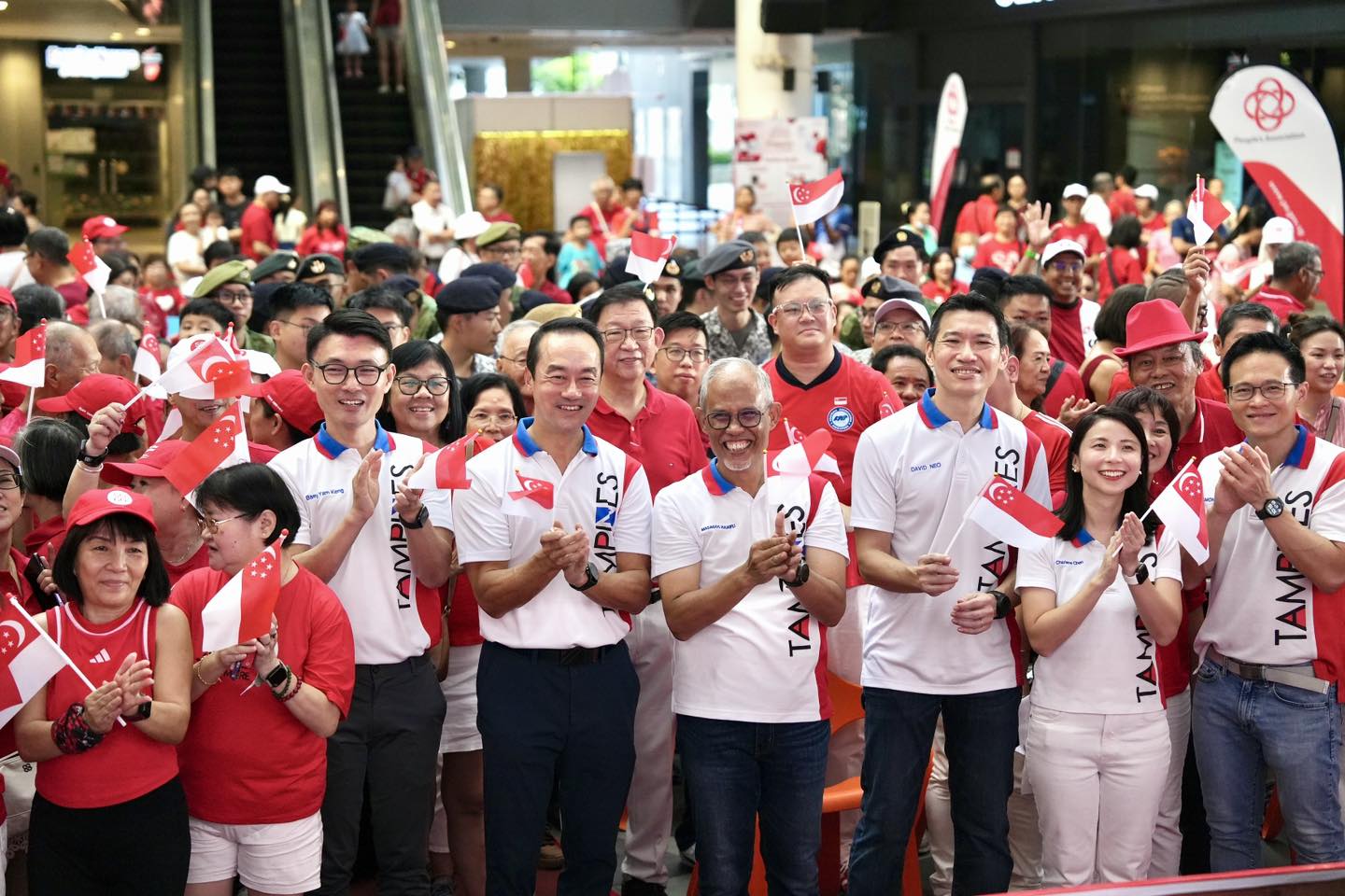 Joyful participants at a National Day event in Tampines