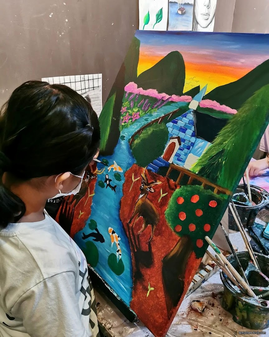 A child wearing a mask is painting a landscape scene on canvas.