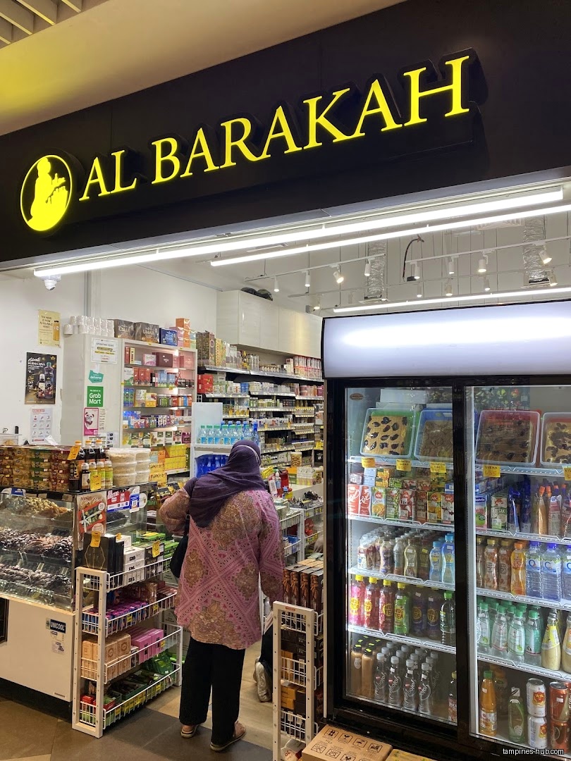 Al Barakah Tampines Hub shop front with a customer inside.