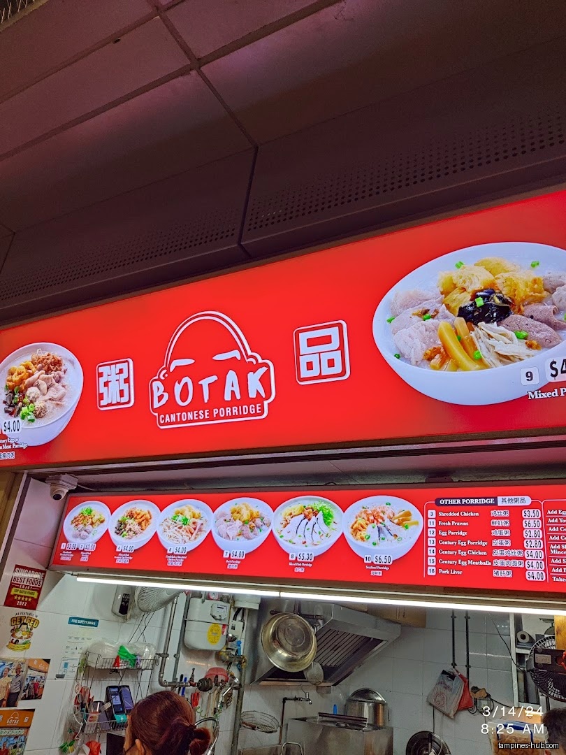 The image shows the menu board for Botak Cantonese Porridge shop.