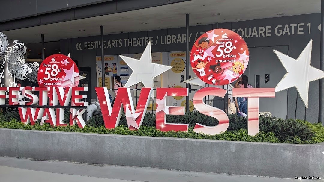 The image shows the entrance to Festive Walk West at Central Plaza.