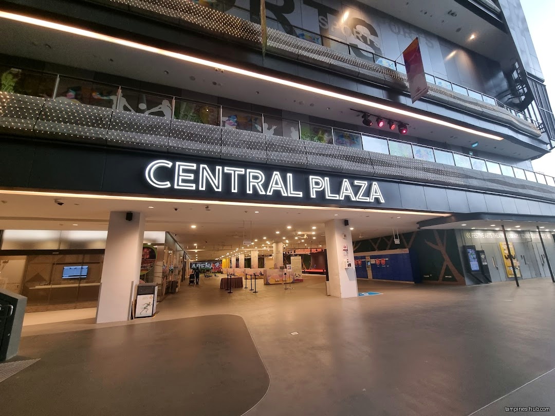 Exterior view of Central Plaza with entrance and signage visible.