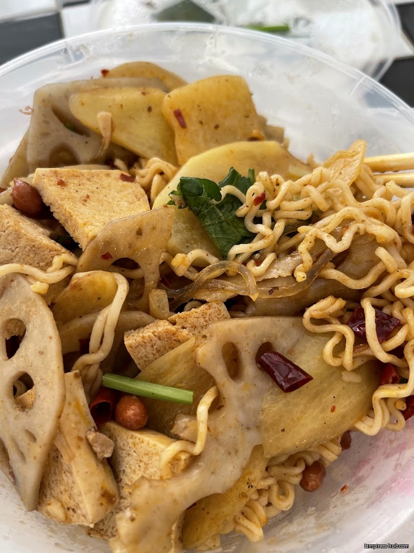 A close-up shot of Chinatown Mala Hotpot food in a container.