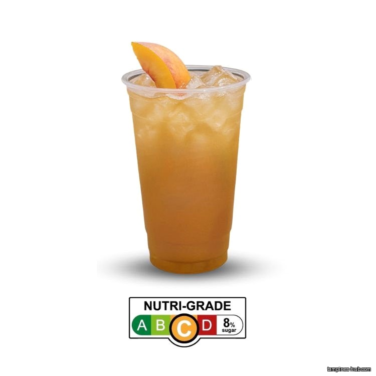 A peach iced tea drink in a plastic cup with a nutri-grade.