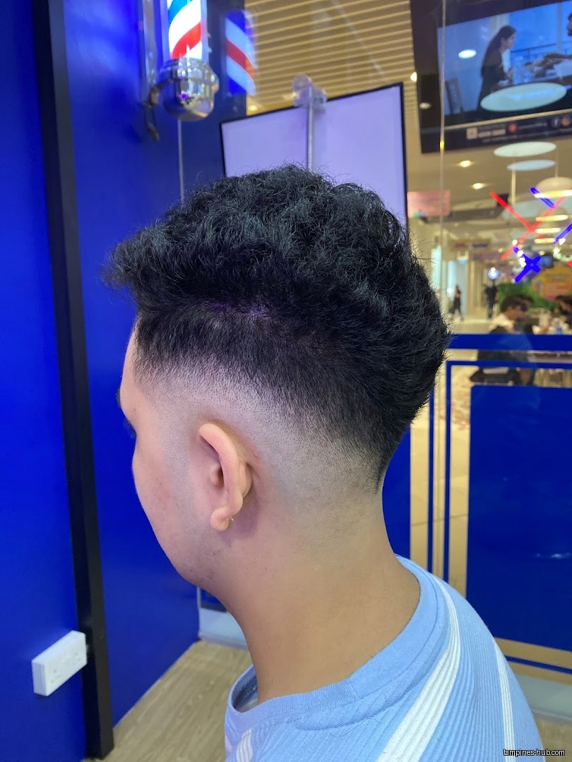 Close-up of a man's haircut at Clippers Barber Our Tampines Hub.