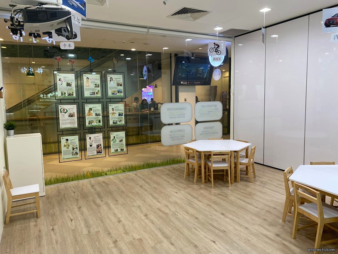 The EduGrove Mandarin Enrichment Centre has tables and posters in the window.