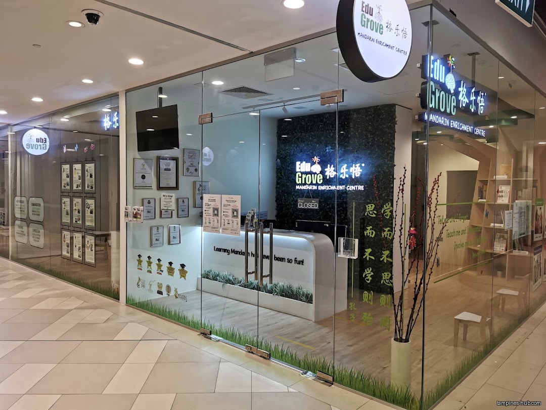 The image shows the shop front of EduGrove Mandarin Enrichment Centre.