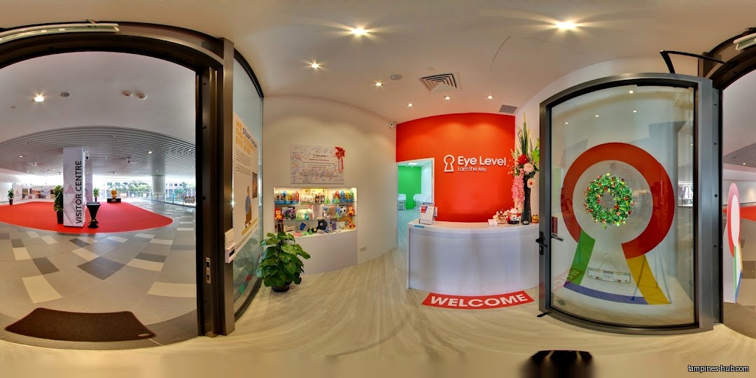 Eye Level Learning Centre's interior with a reception desk and entrance.