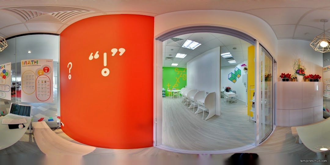 Interior view of Eye Level Learning Centre with colorful walls and classrooms.
