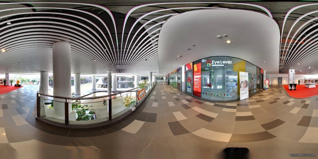 Eye Level Learning Centre storefront in a modern, open-air mall setting.