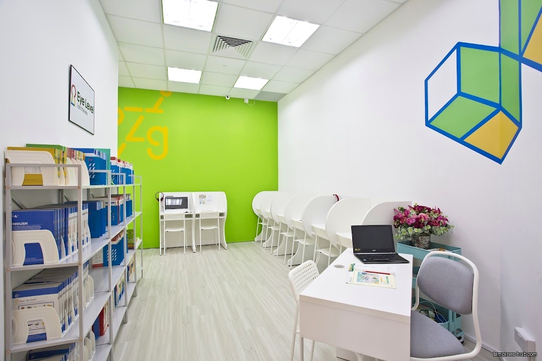 The image shows the interior of the Eye Level Learning Centre.