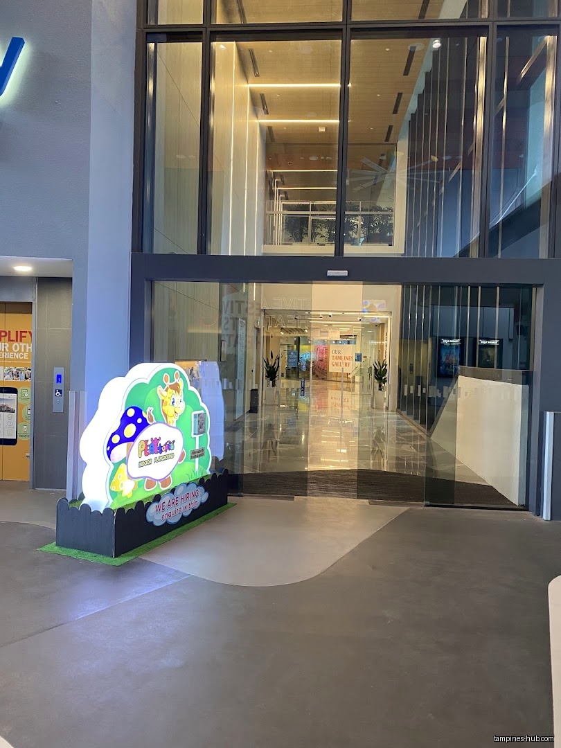 Festive Arts Theatre entrance with glass doors and a hiring sign.