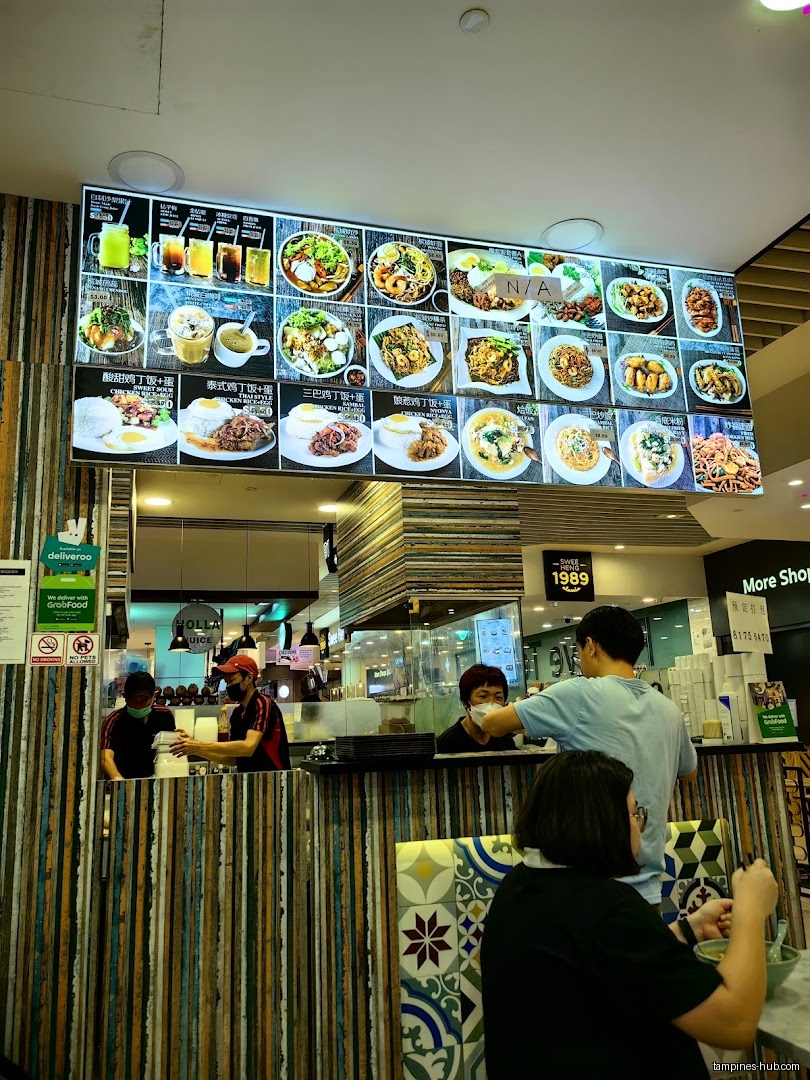 A large menu board displays various food dishes above a restaurant counter.