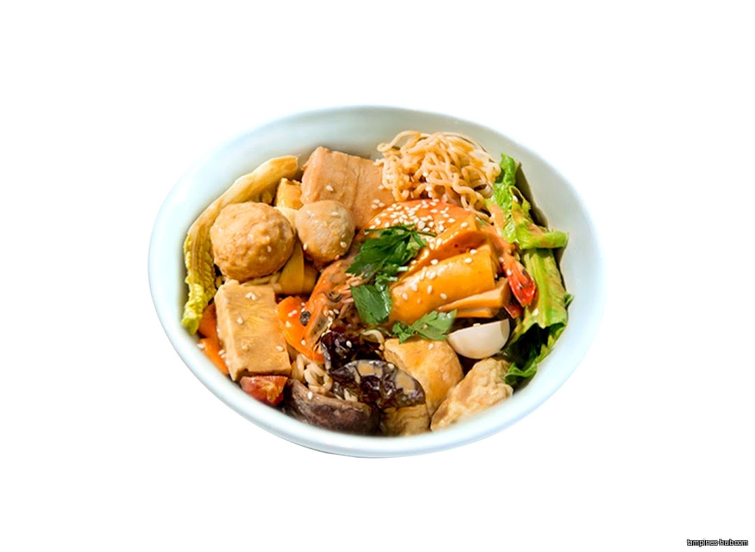 A bowl of Ma La Tang with various ingredients is shown.