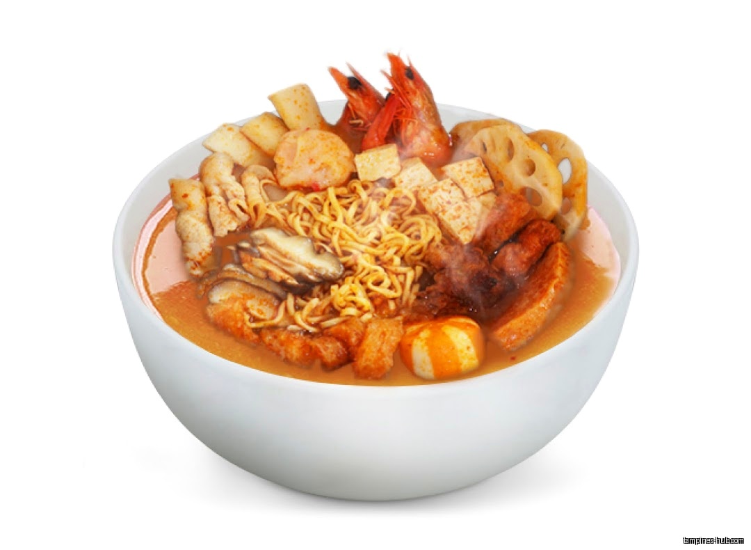 A bowl of Ma La Tang with noodles, shrimp, tofu, and vegetables.