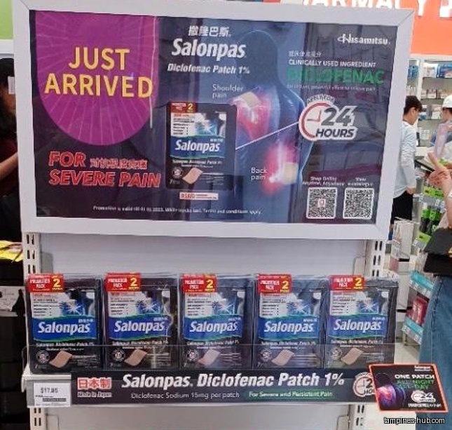 A shelf displays Salonpas Diclofenac Patch 1% with promotional signage above.