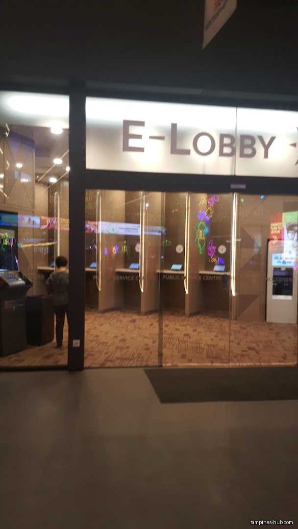The HDB Tampines Branch E-Lobby entrance with service counters is visible.