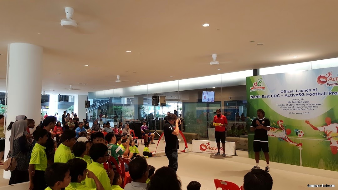 A crowd watches the official launch of the ActiveSG Football Program.