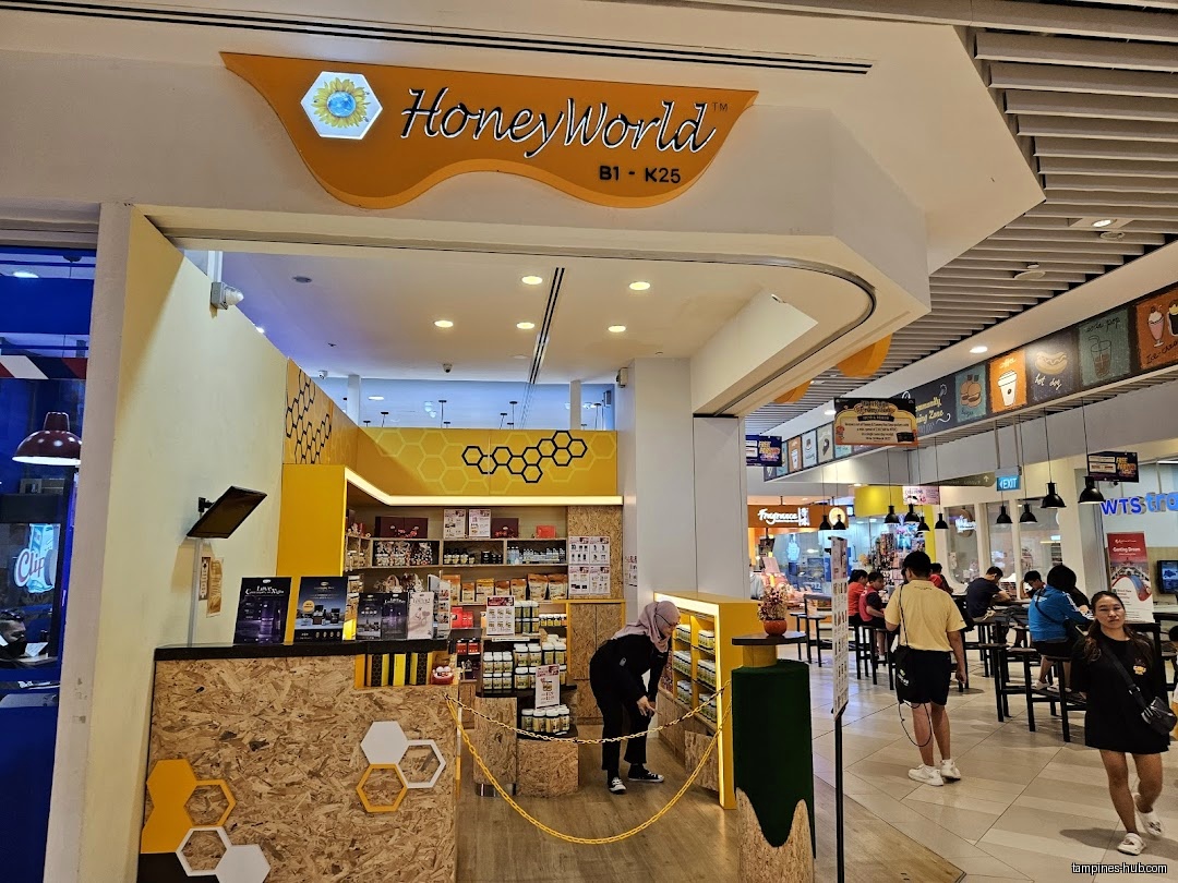 HoneyWorld shop front with customers browsing inside the store.
