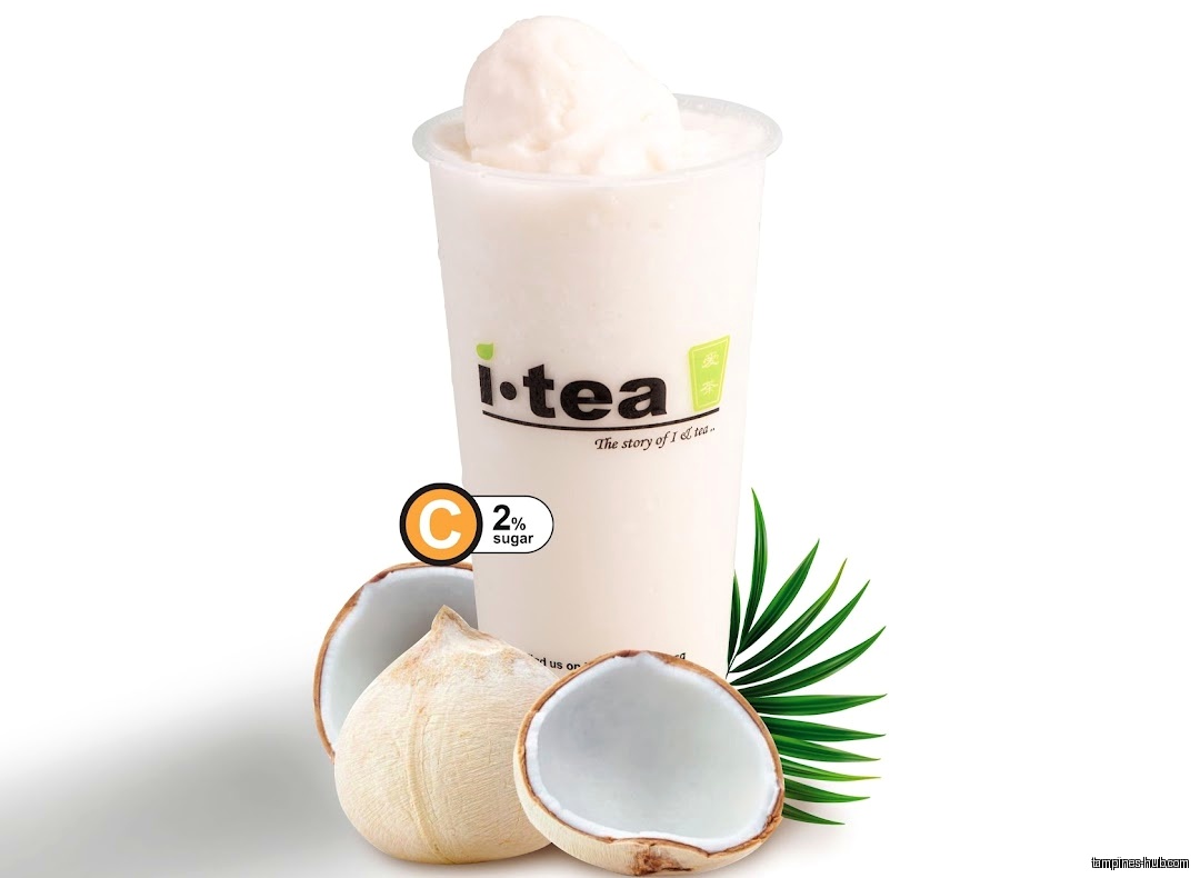 iTEA drink with coconut and palm leaf on a white background.