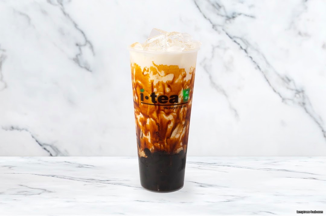 A cup of iTEA brown sugar milk tea with ice.