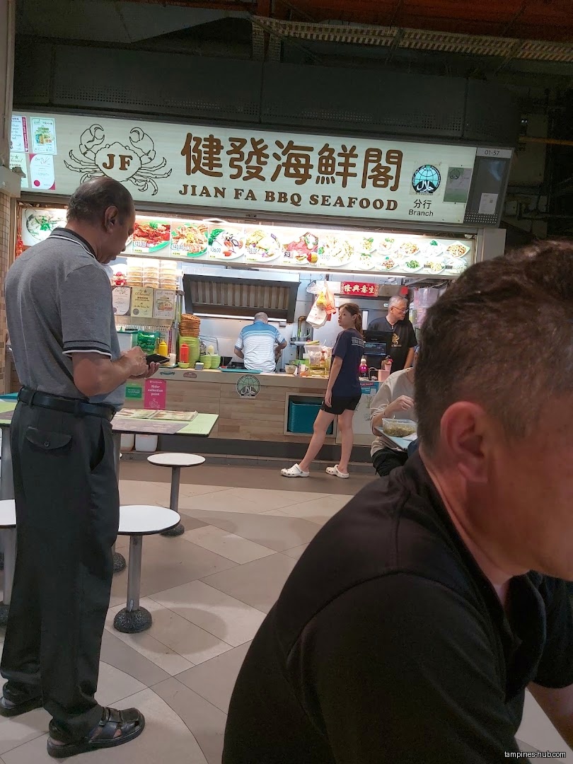 Jian Fa BBQ Seafood shop front with customers and staff visible.