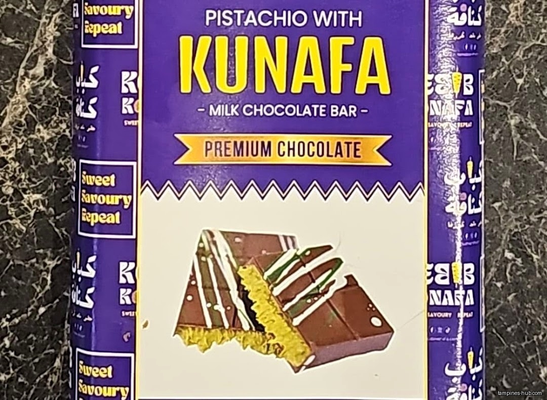 A close-up of a Pistachio with Kunafa milk chocolate bar package.