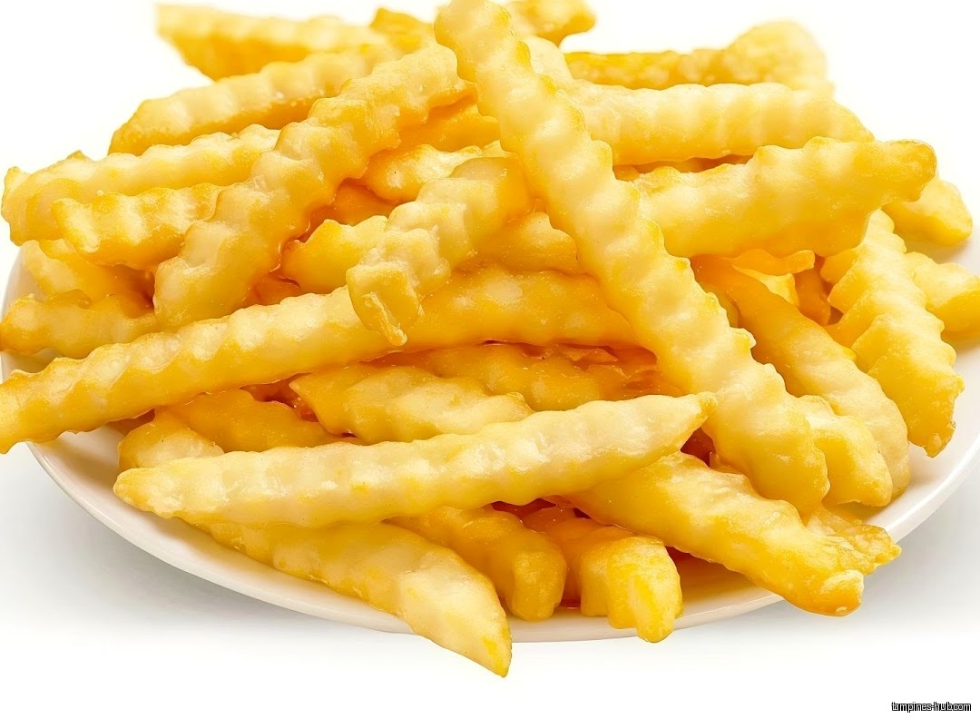 A pile of crinkle-cut french fries on a white plate.