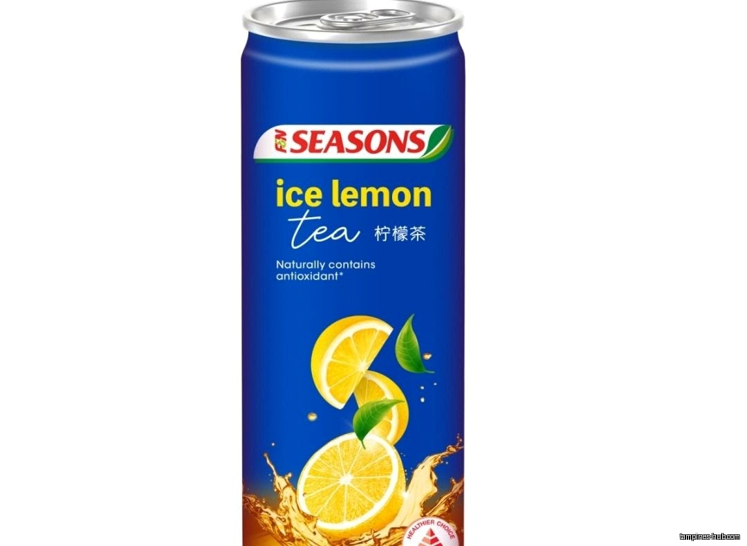 A can of Seasons ice lemon tea with lemon slices on it.