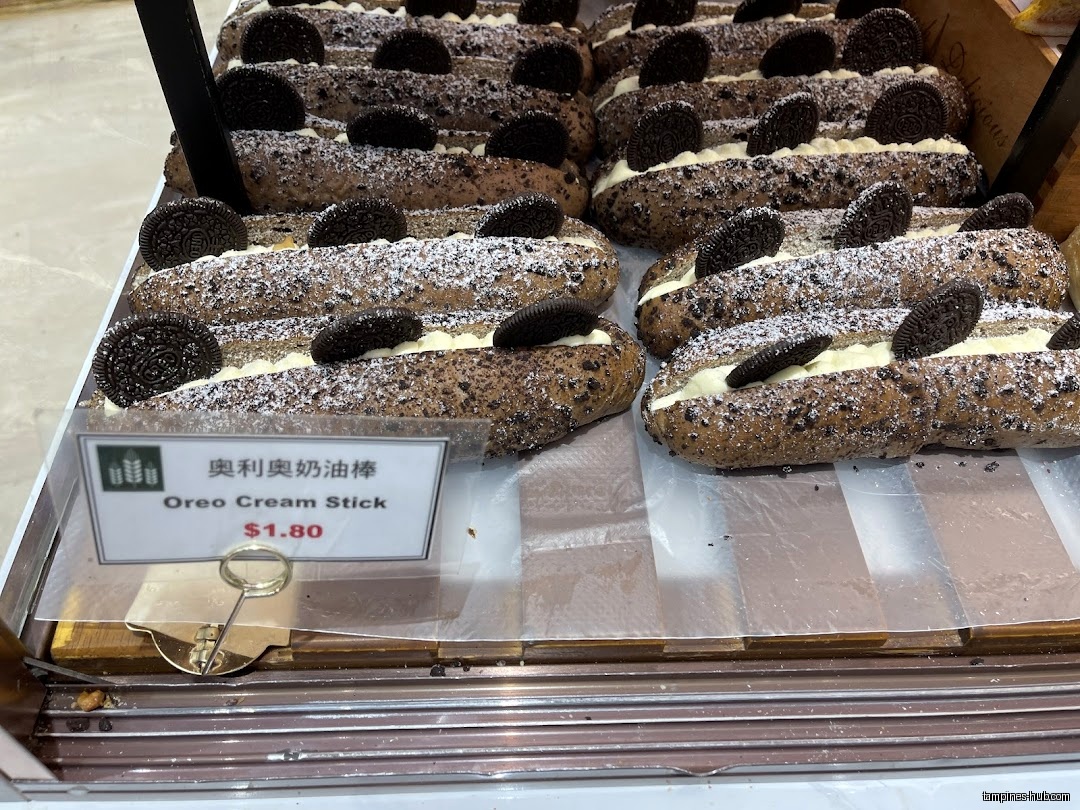 Rows of Oreo Cream Sticks are displayed with a price tag.
