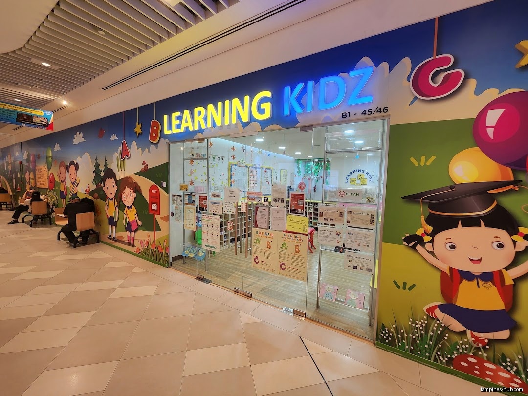 The shop front of Learning Kidz with colorful cartoon decorations.