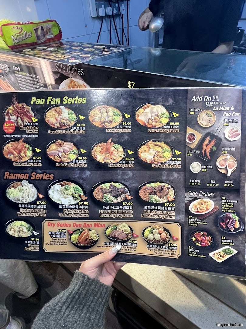 A close-up shot of the Lobster King Pao Fan menu board.