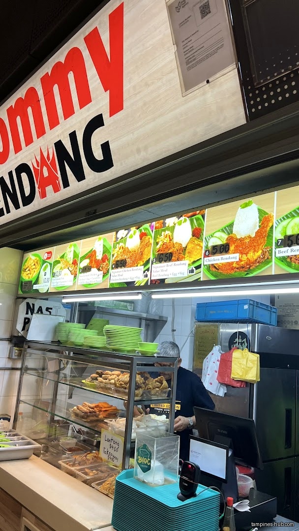 Mommy Rendang shop front with menu board and food display.