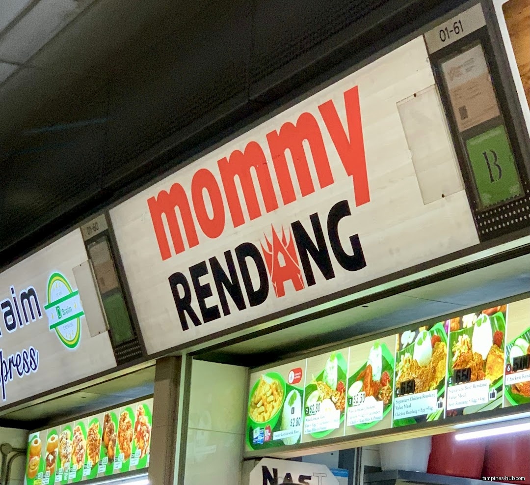 Mommy Rendang shop front with menu board displaying food items and prices.