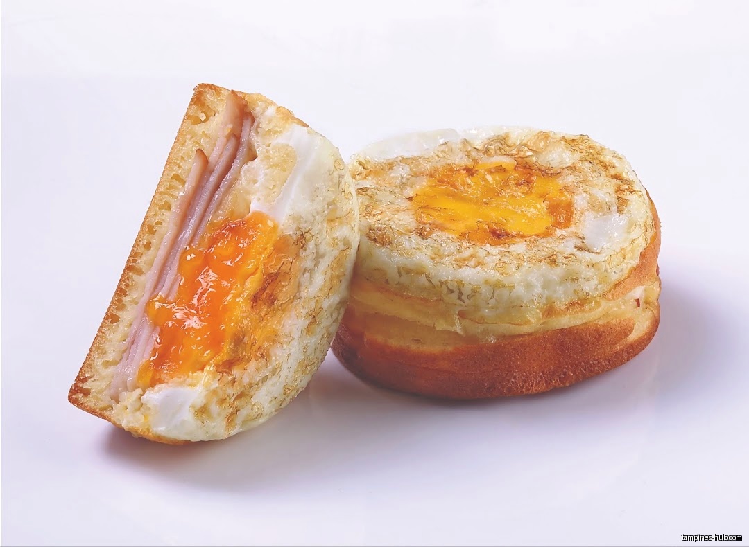 Two Mr Bean eggwich sandwiches are displayed on a white surface.