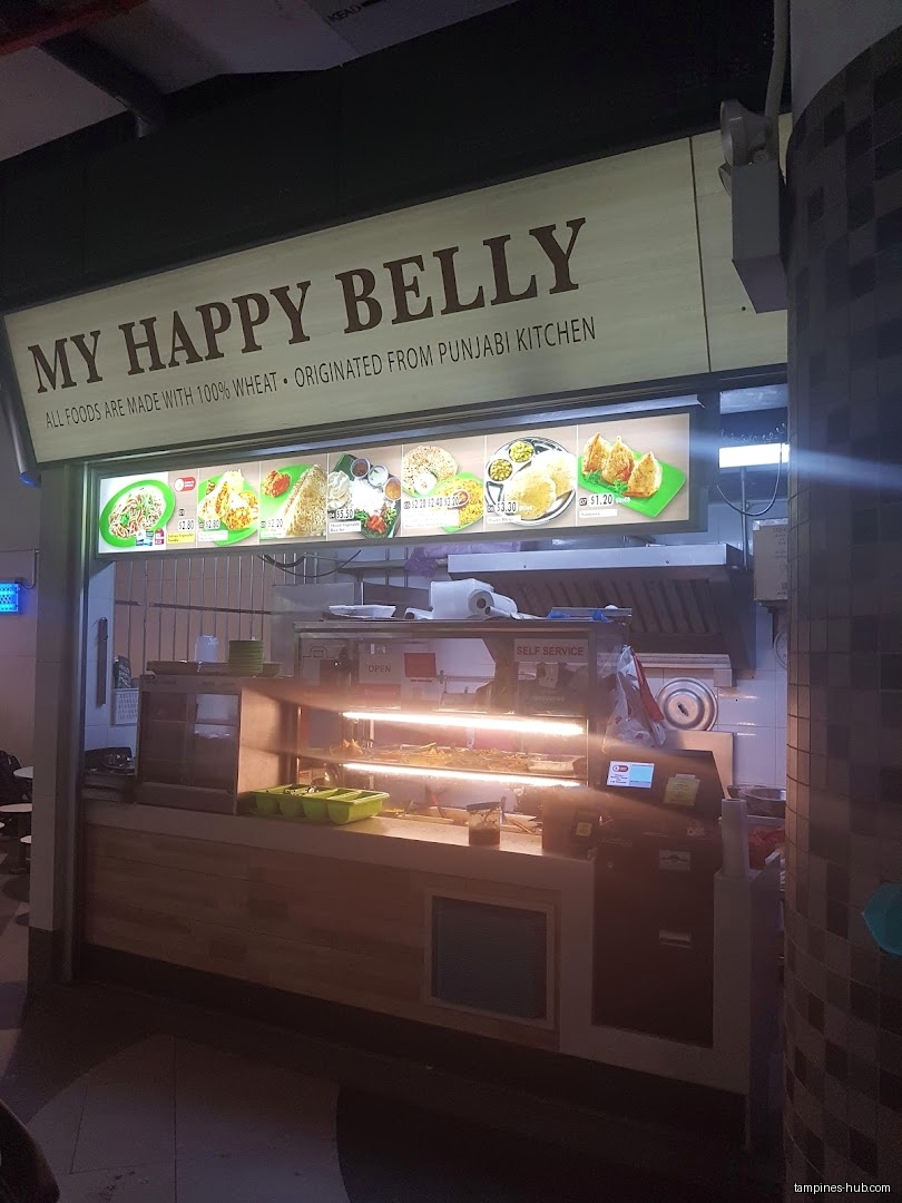 My Happy Belly shop front with menu board and service counter.