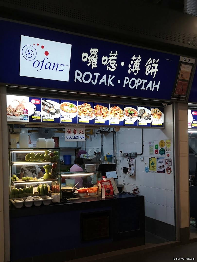 Ofanz Rojak • Popiah shop front with menu and fresh ingredients.