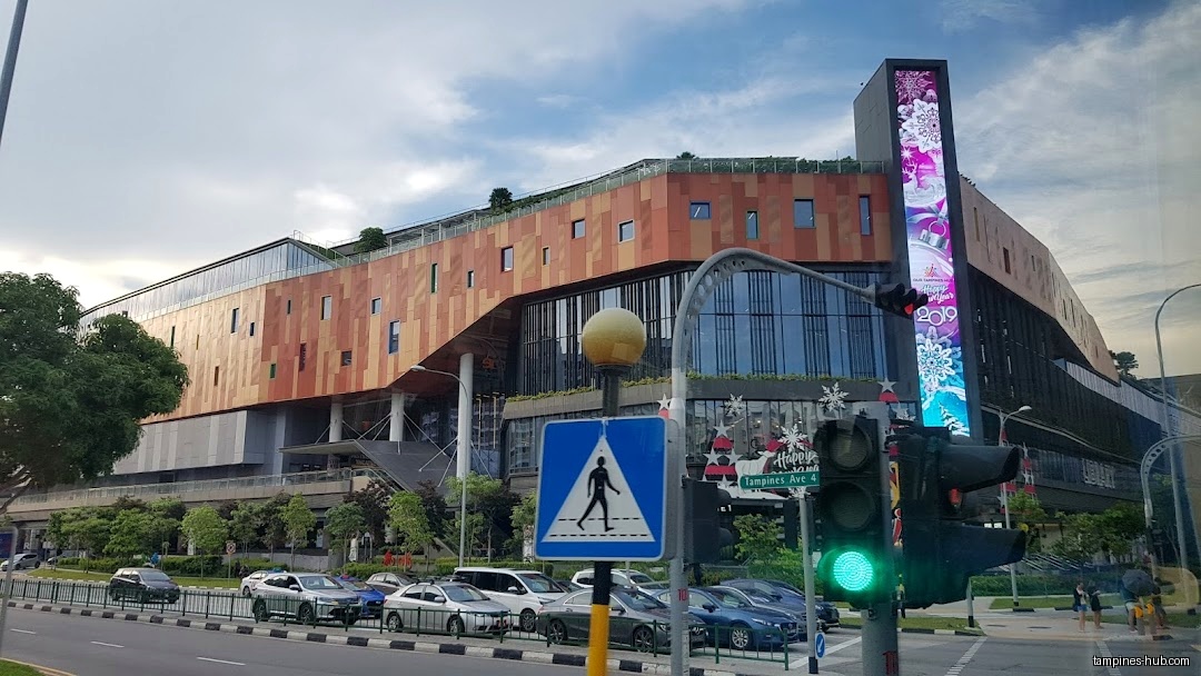 Our Tampines Hub ActiveSG Community Auditorium building exterior with street view.