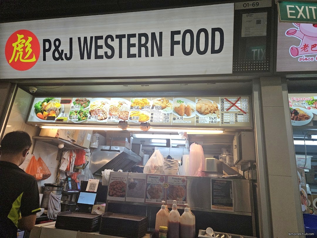 P&J Western Food shop front with menu board and food preparation area.
