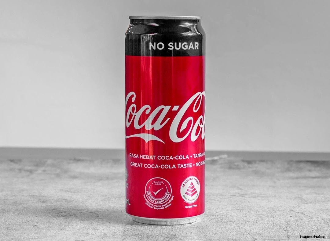 A can of Coca-Cola No Sugar is displayed on a surface.