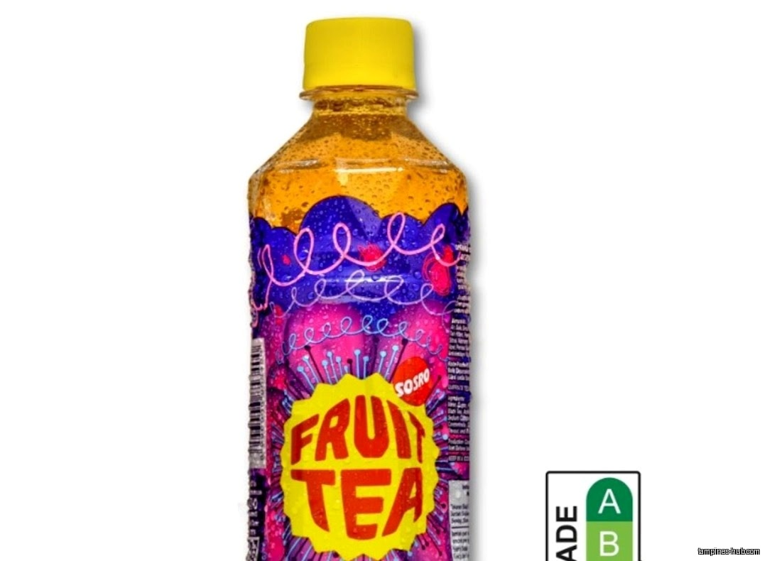 A bottle of Sosro Fruit Tea with a yellow cap is shown.