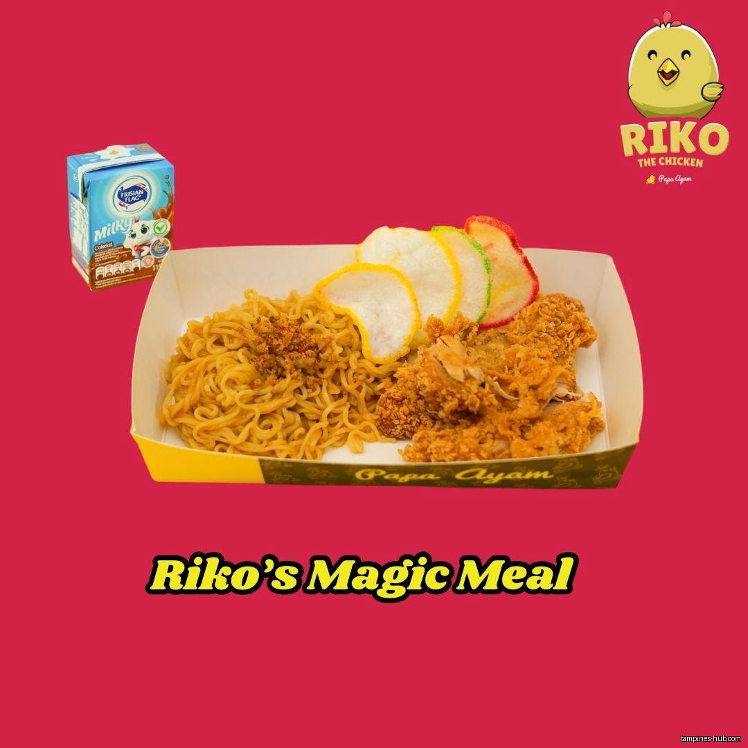 A meal box with noodles, fried chicken, crackers, and a milk drink.