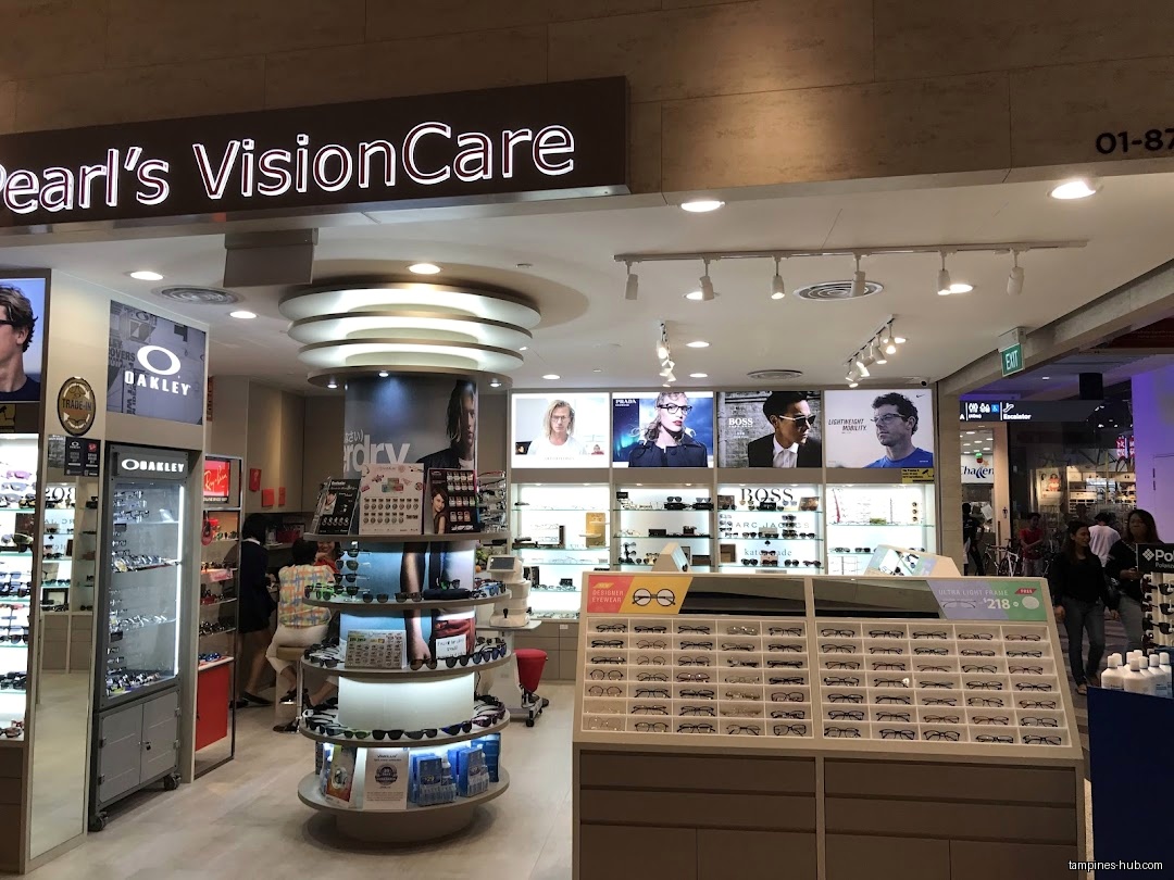 The image shows the interior of Pearl's Visioncare, displaying eyewear.